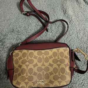 Burgundy and beige handbag with crossbody strap